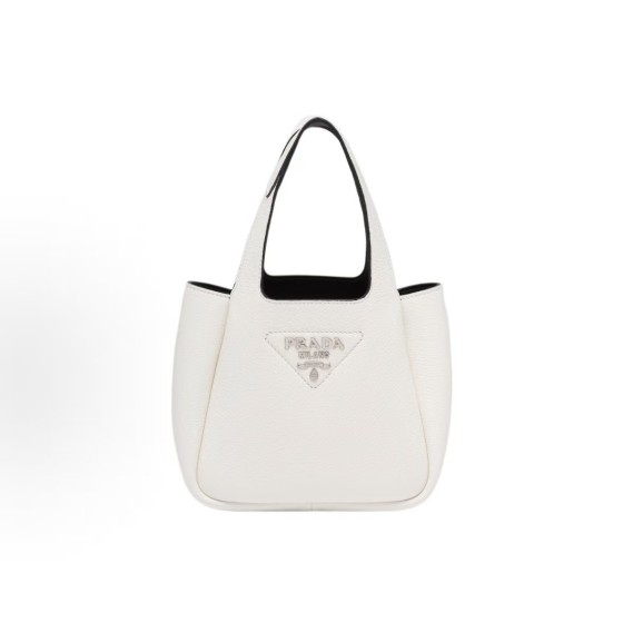 PRADA, a white women\'s handbag with a metal engraved logo and magnetic clasp, featuring a shoulder strap and a vegetable basket